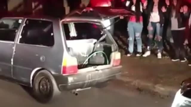 12 people in a fiat uno car BRAZIL