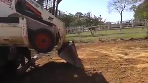 How to load a Bobcat on a dump truck