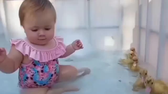 Baby water playing