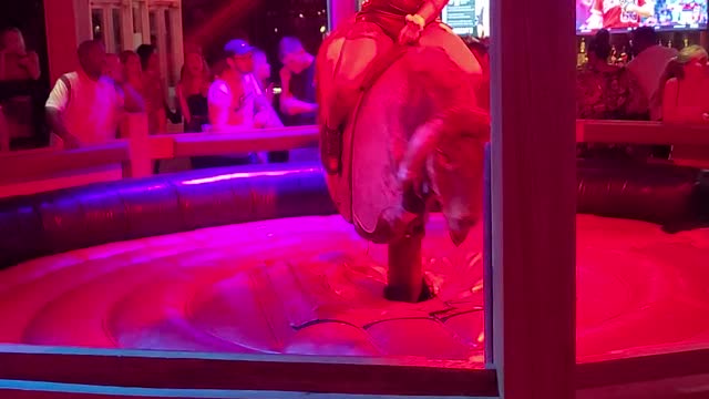 Fine girl 🔥🔥🔥 with MINI skirt on a bull