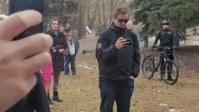 Police in Calgary threw an old lady with PTSD on the ground for selling T-shirts