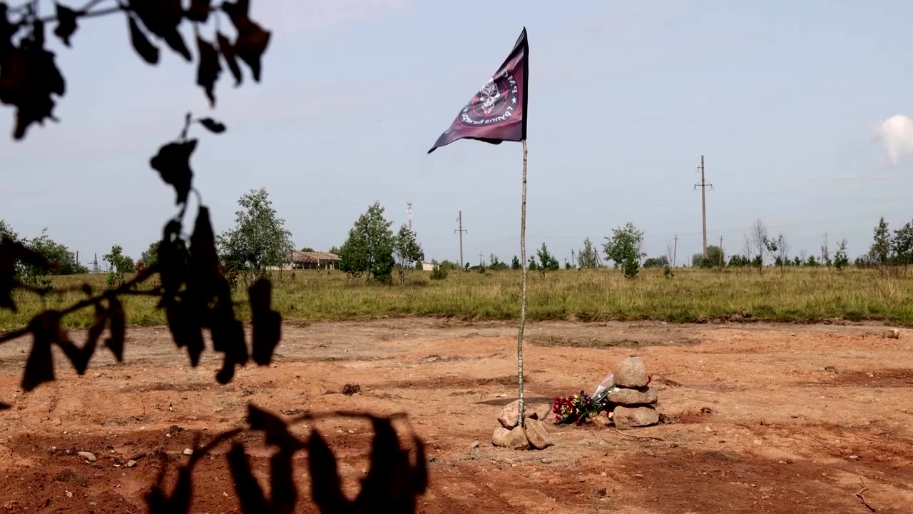 Wagner flag flies at Prigozhin plane crash site