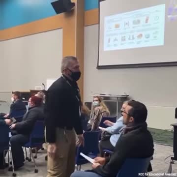 Hypocrisy exposed after maskless parent DRAGGED from school meeting