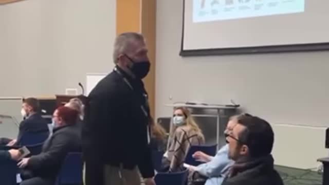 Hypocrisy exposed after maskless parent DRAGGED from school meeting