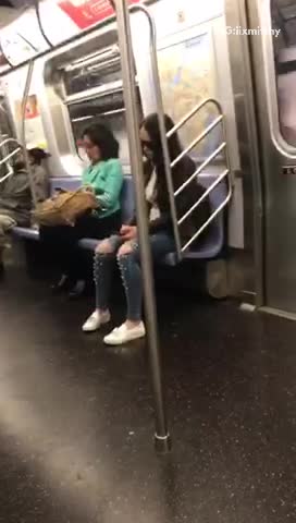 Girl with pearls on knees of jeans