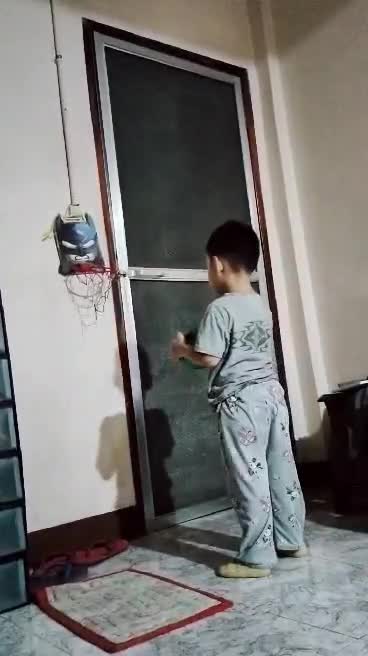 Filipino Child Playing Hoop