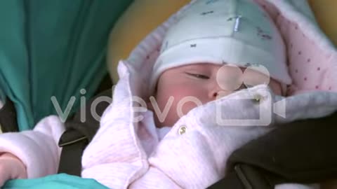 Baby in pushchair 02