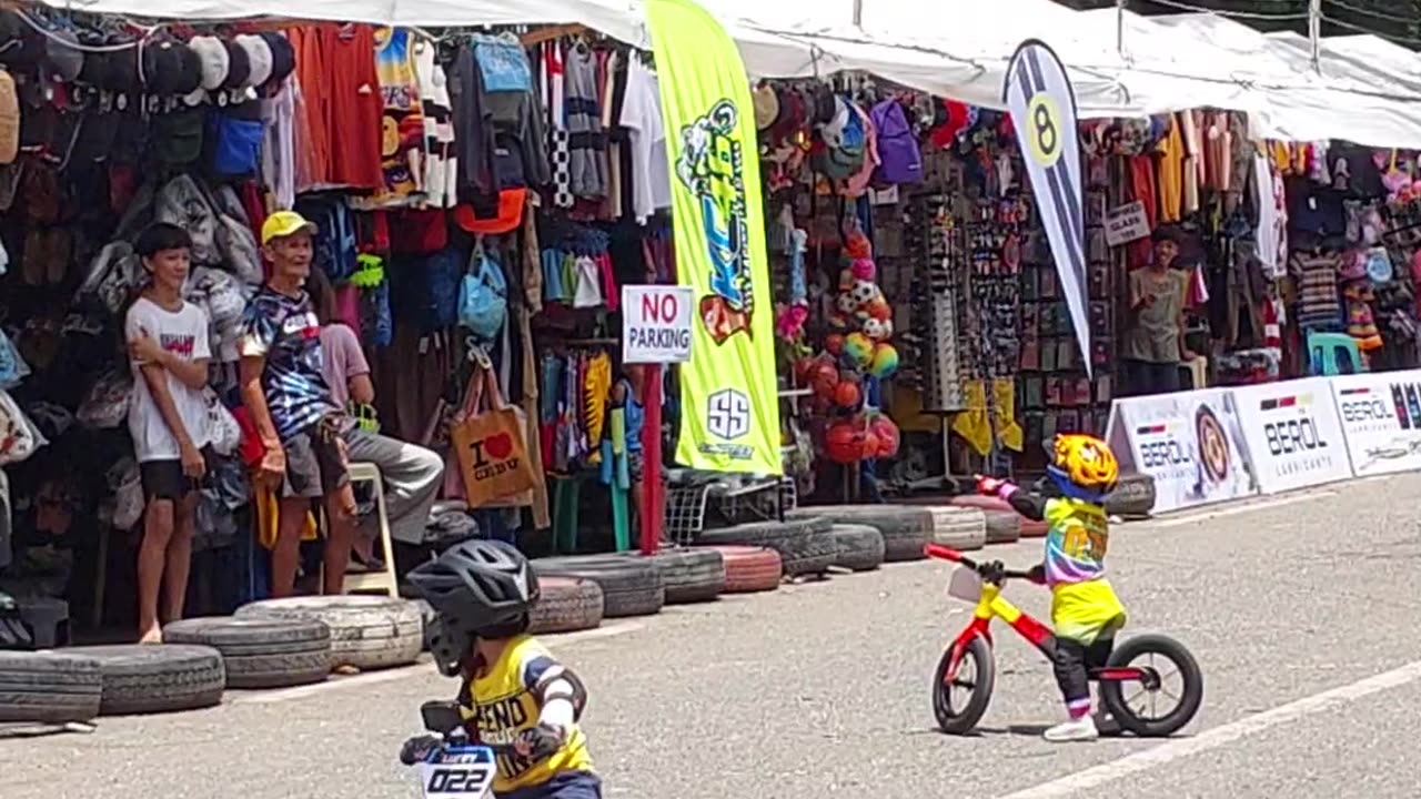 Boy in Bike Race Gets Distracted