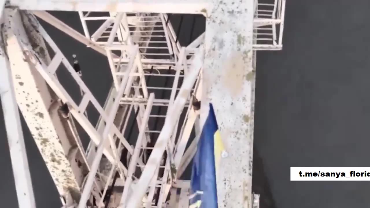 War with flags. A Ukrainian drone set up, a Russian drone shot down.