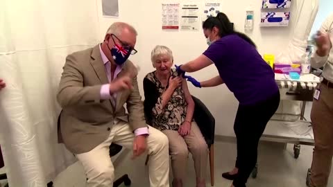 Australian PM and first vaccine recipient share funny moment