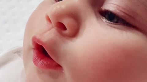 Facial expression of a new brn baby so cute eyes . I know you will adict to this baby