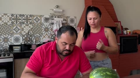 Woman Impatiently Breaks Open Watermelon