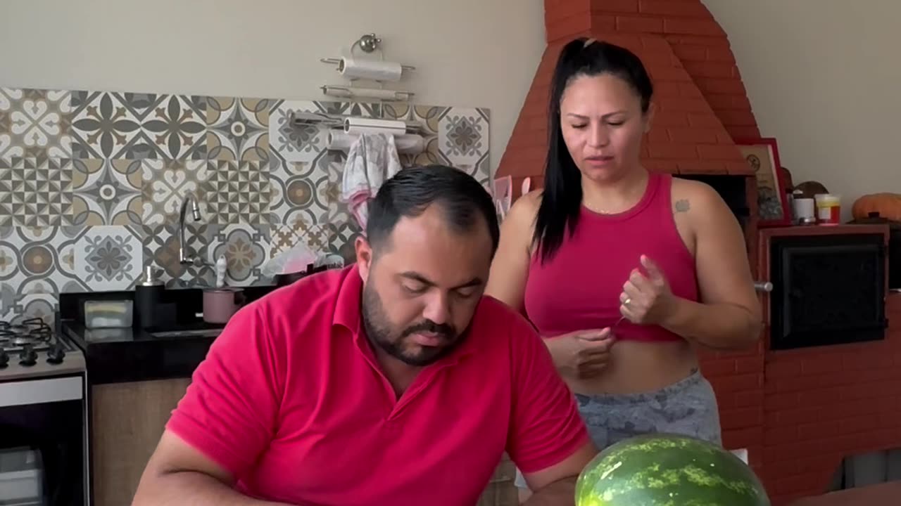 Woman Impatiently Breaks Open Watermelon