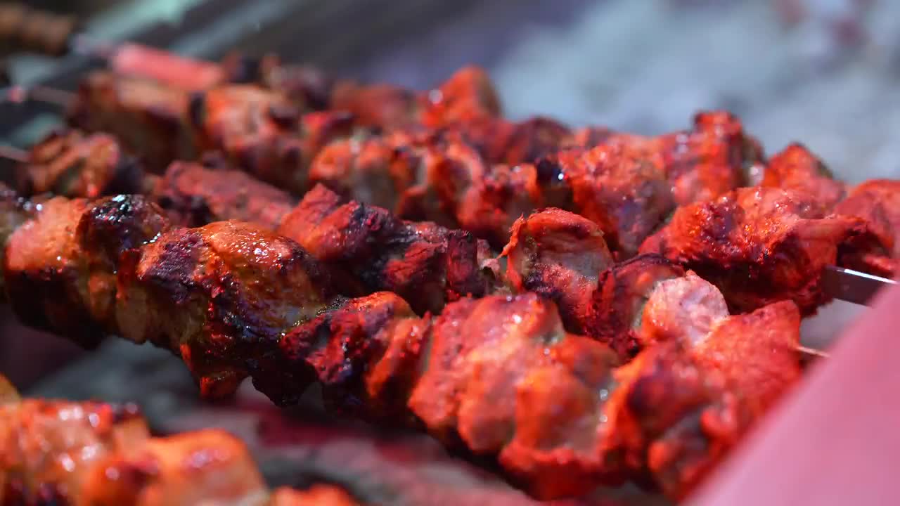 Barbecue rotating on the grill