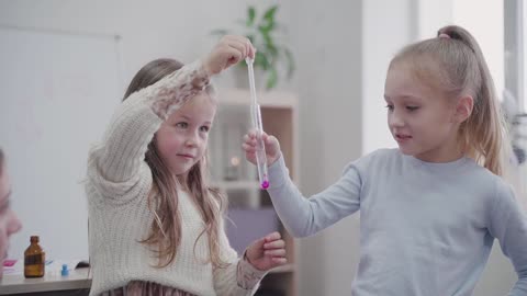 Two Girls in a Chemistry Class