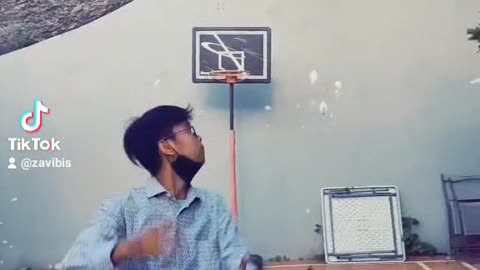 shooting basketball without looking