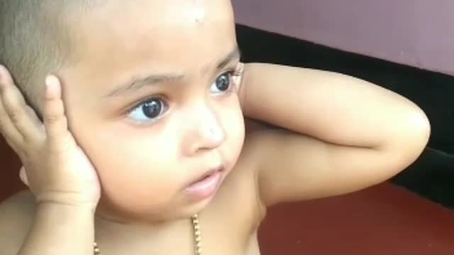 Adorable Indian Child didn't expect Fireworks sounds