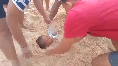 HAVING FUN WITH THIS LITTLE BOY AT THE BEACH