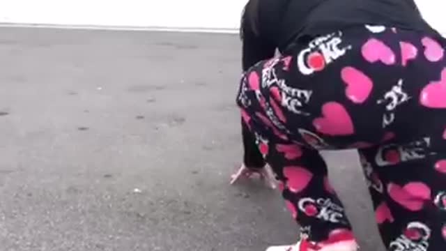 Dog trips girl in pajamas