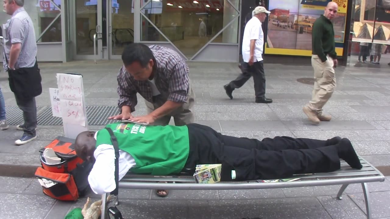 Luodong Massages African Man In Green Jacket