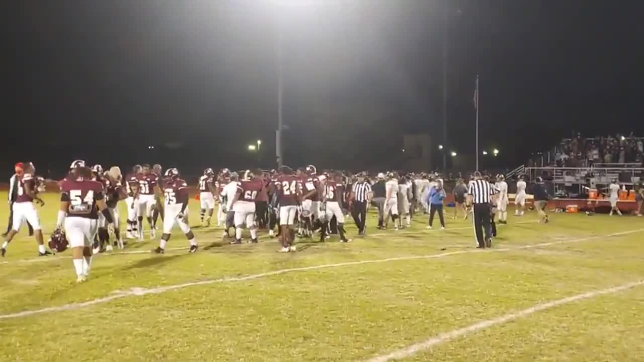 Football brawl: Players fight after a team flew a 'back the blue' flag