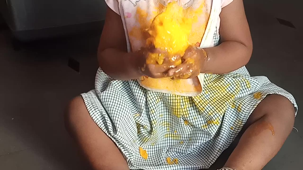 Cute girl eating mango ðŸ¥