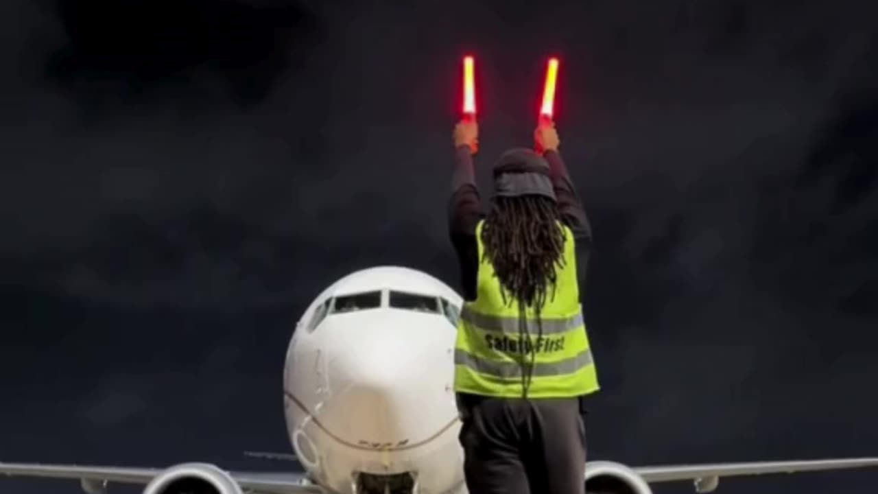 Ground Staff Marshalling a Flight—Coordination at Its Best! ✈️🤚