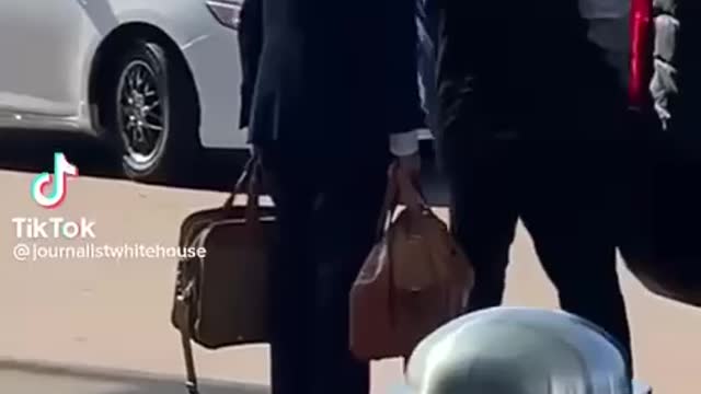 Joe Biden is being pick it in a Uber