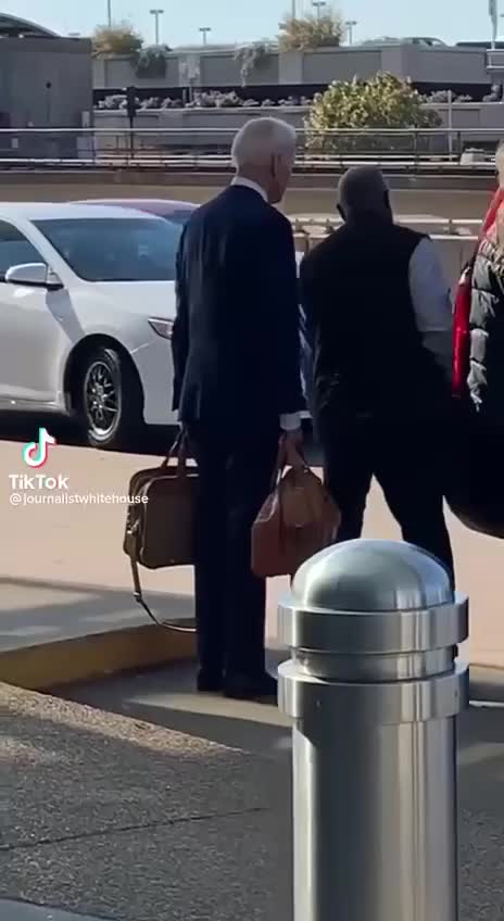 Joe Biden is being pick it in a Uber