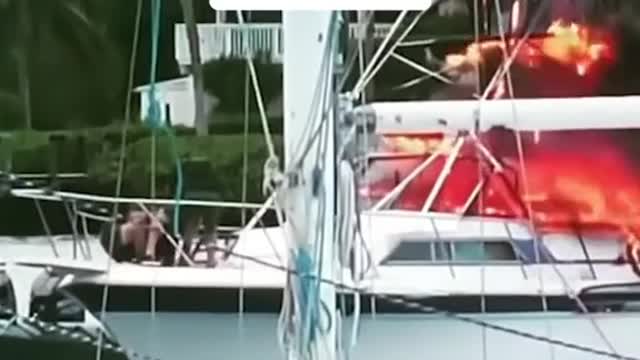 Police rescue unresponsive man on burning boat in Florida