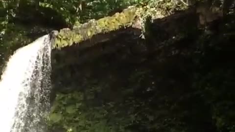 waterfall jump at pontneddfechan waterfall country