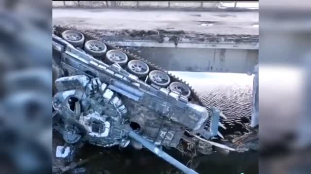 A Russian T-72B tank fell off a bridge