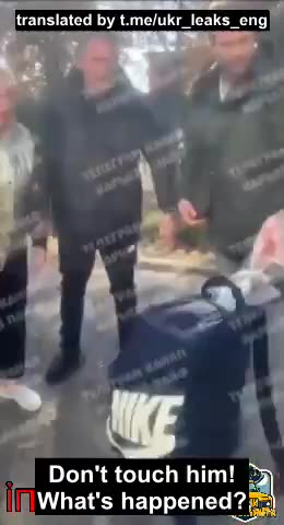 The Ukrainian Zelensky regime's TCC abductors in civilian clothing trying to abduct a Ukrainian man
