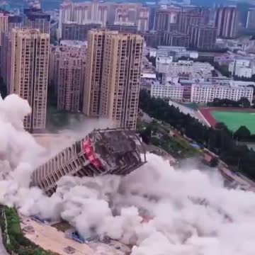 China: Fifteen brand new high rise buildings purposely blown up in 15 seconds