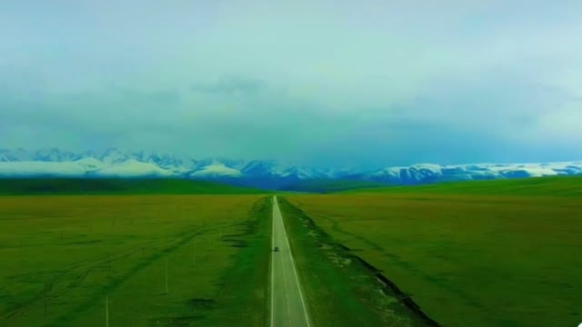 green hills and white clouds