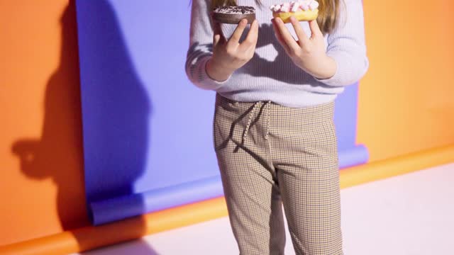 Girl Eating a Doughnut