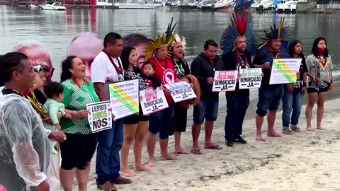 Indigenous climate protesters sink heads of G20 leaders in Brazil