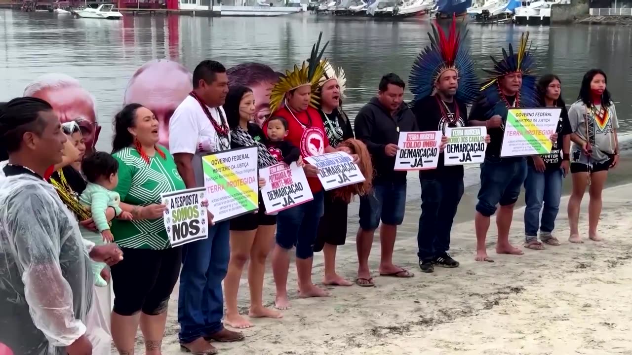 Indigenous climate protesters sink heads of G20 leaders in Brazil