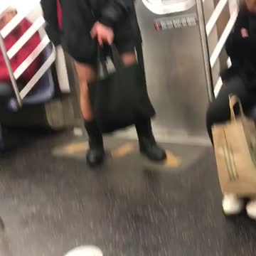 Man in black leather jacket short shorts