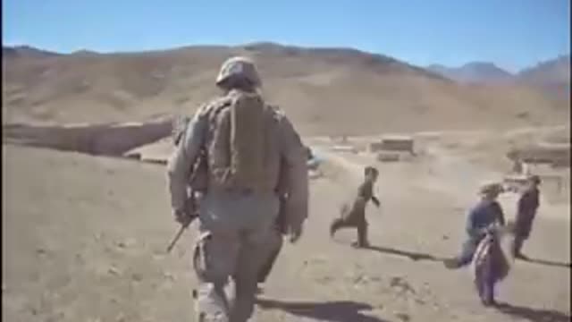 US soldiers playing with Afghanistan kids