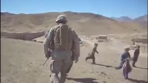 US soldiers playing with Afghanistan kids