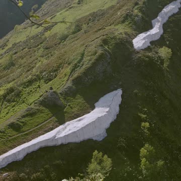 High Angle Footage Of A Mountain Peak With Snow Residue