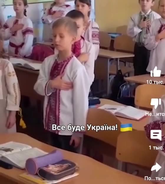 Ukrainian children sing the Ukrainian anthem in English for their "Independence Day