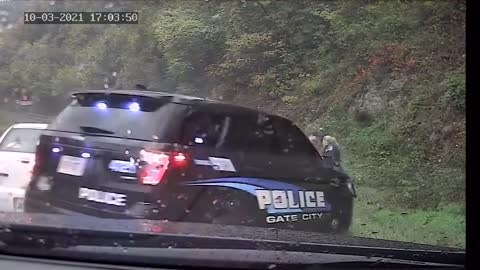 Virginia policeman saves fellow officer from oncoming car