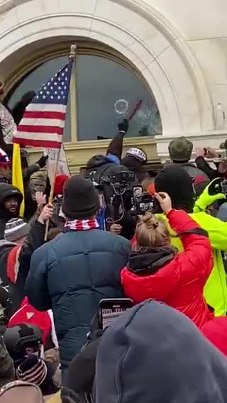 Trump Supporters pulling Antifa terrorists away from Capitol building