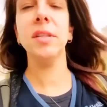 A nurse is escorted out of her job for not taking the vaccine.