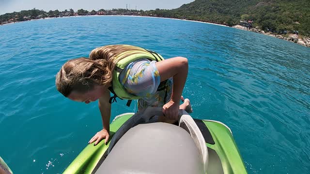 swimming in the open sea jet ski