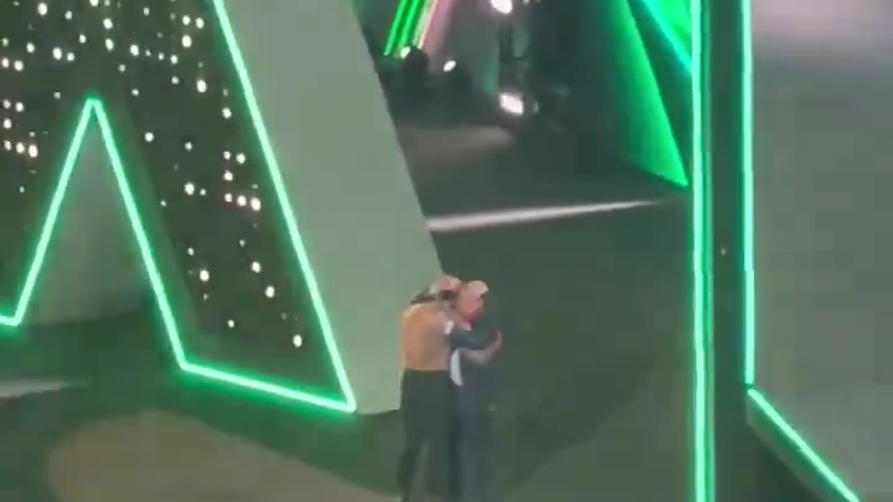 ROMAN REIGNS AND PAUL HEYMEN HUG AFTER LOSING TO CODY RHOADES