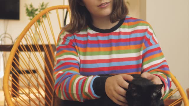 Woman petting a cat