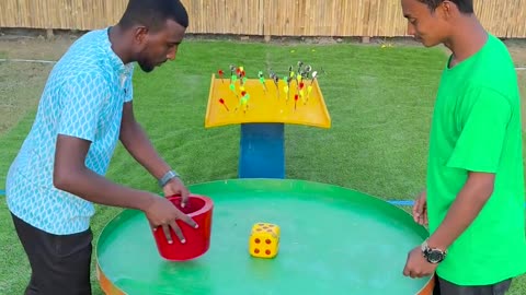 Who can combine luck & skill to pop all the balloons